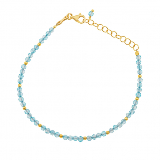 Bracelet en argent doré et perles zircon bleues