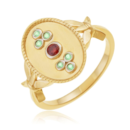 Bague en or jaune et rhodié, péridots et grenat, ovale