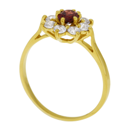 Bague en or jaune, grenat ovale  et oxydes de zirconium