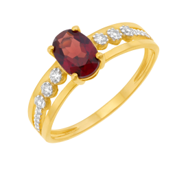 Bague en or jaune et rhodié, grenat et oxydes de zirconium