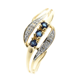 Bague en or jaune rhodié, saphirs et diamants