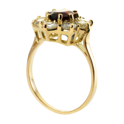 Bague en or jaune, grenat et oxydes de zirconium