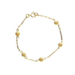Bracelet en or jaune et boules granitées