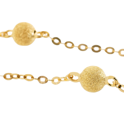 Bracelet en or jaune et boules granitées