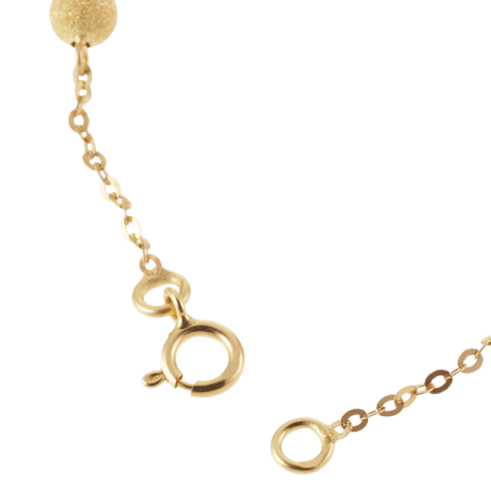 Bracelet en or jaune et boules granitées