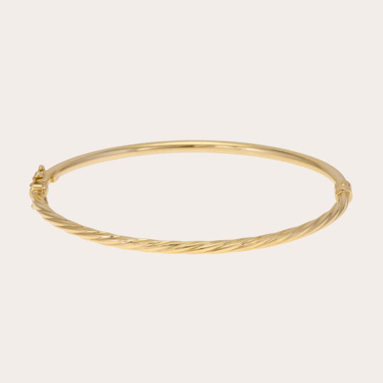 Bracelet jonc ouvrant torsadé en or jaune