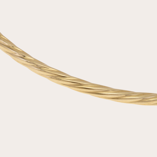 Bracelet jonc ouvrant torsadé en or jaune