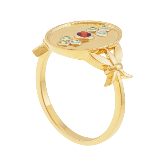 Bague en or jaune et rhodié, péridots et grenat, ovale