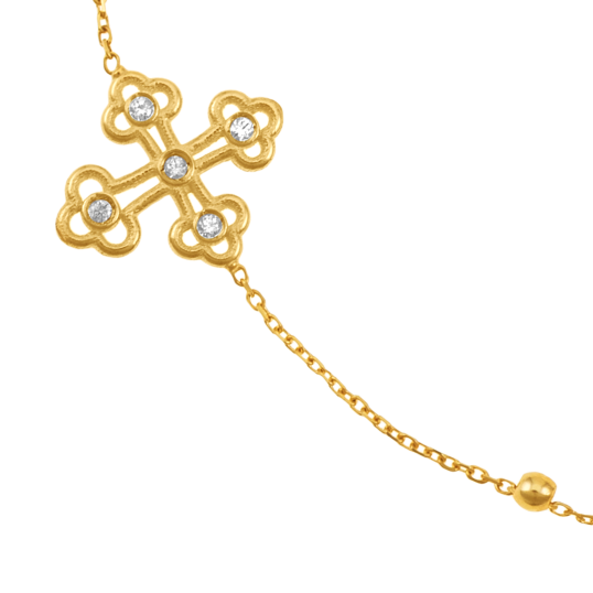 Bracelet en or jaune et oxydes de zirconium, croix
