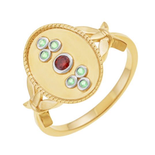 Bague en or jaune et rhodié, péridots et grenat, ovale